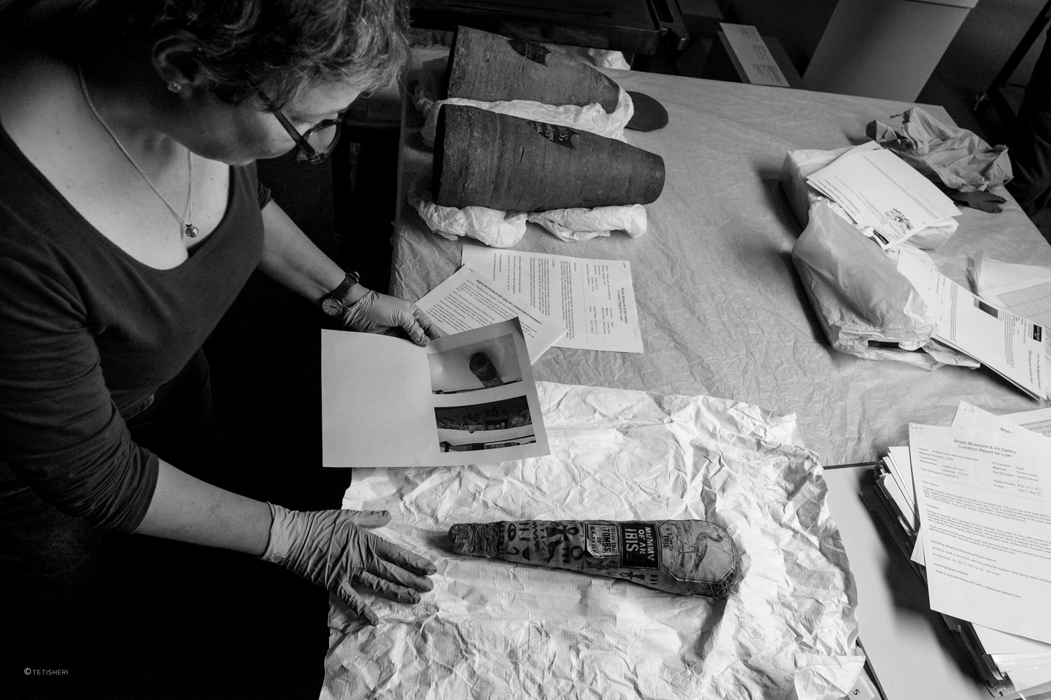 museum conservators unpacking ancient egyptian artefacts