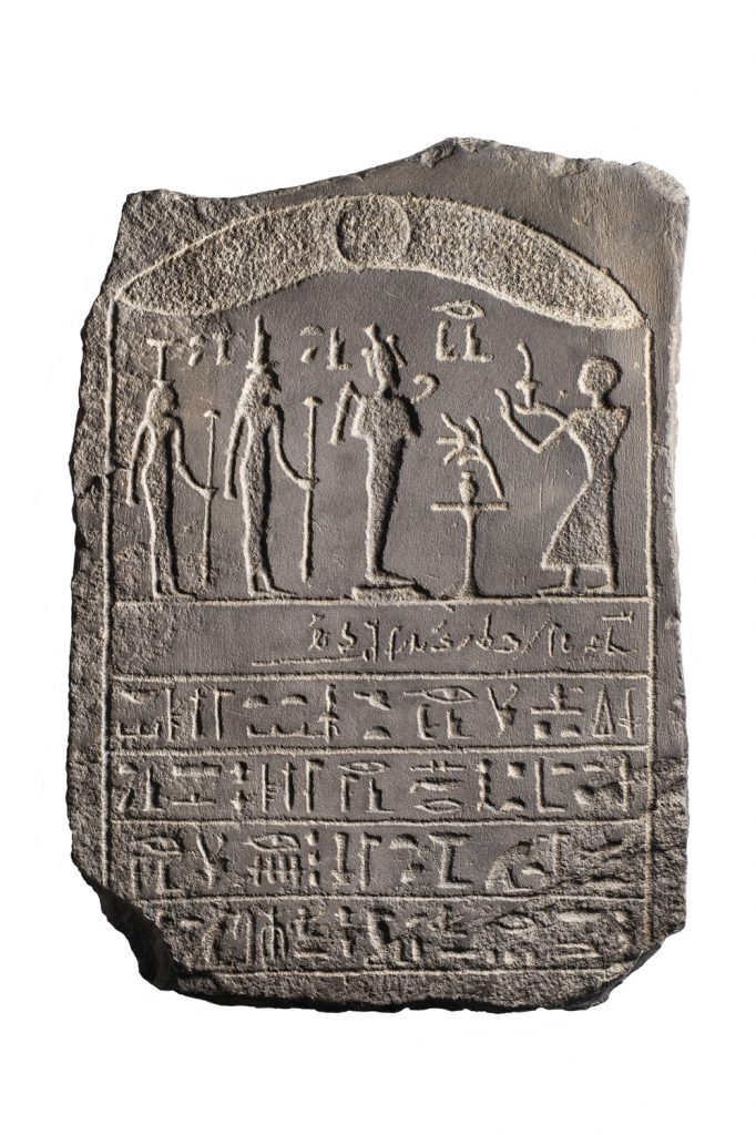 An ancient Egyptian basalt stela with inscriptions in demotic and hieroglyphs