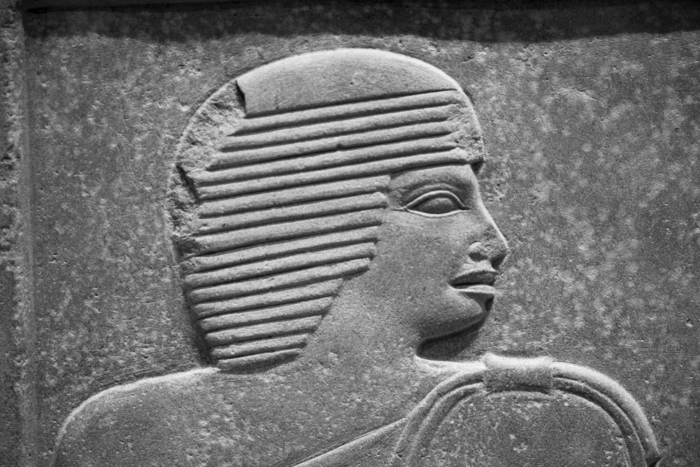 Close-up of a face in profile on an ancient Egyptian carved stone stela