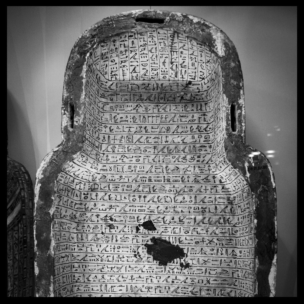 The inside of an ancient Egyptian coffin, covered in hieroglyphs