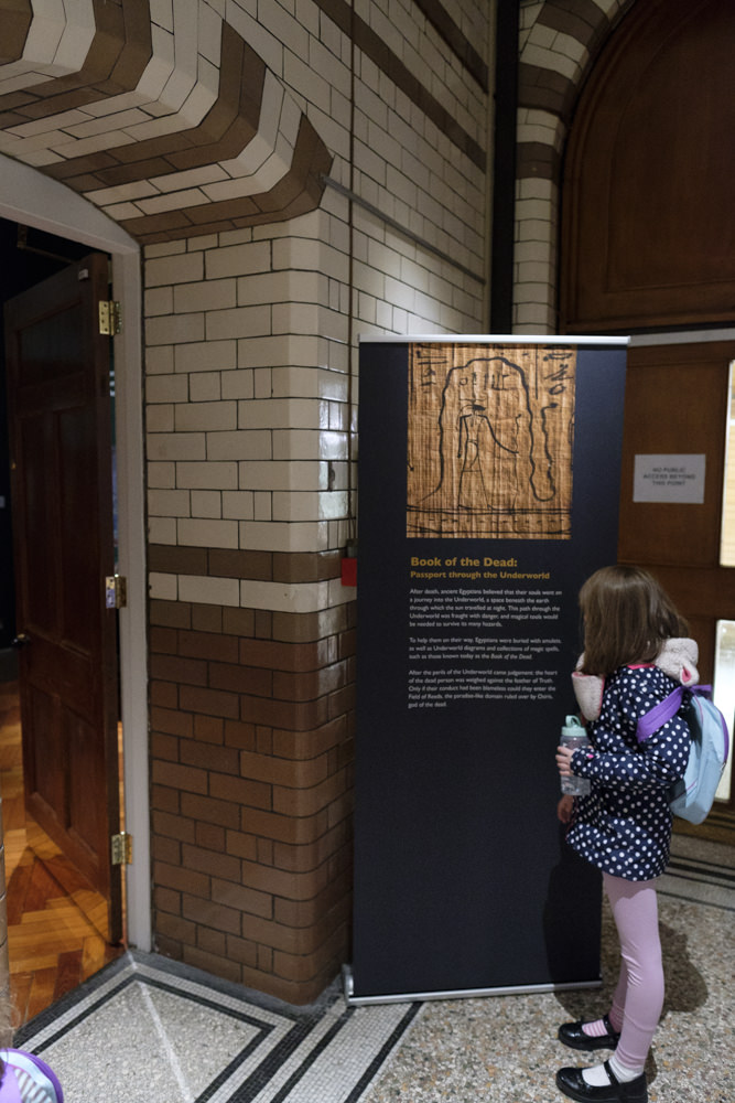 The doorway to an exhibition with signage