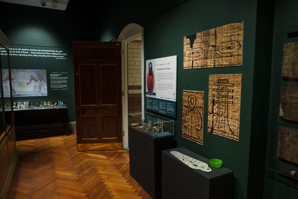 Part of a museum exhibition room with ancient Egyptian objects on display