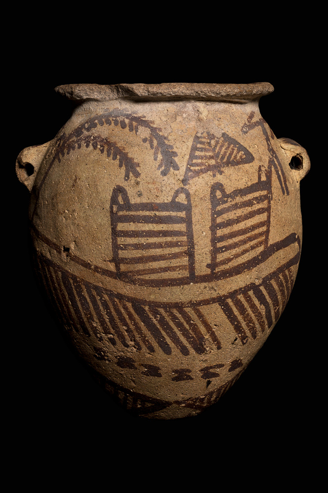 A small, ovoid pot with Predynastic images of a boat and trees