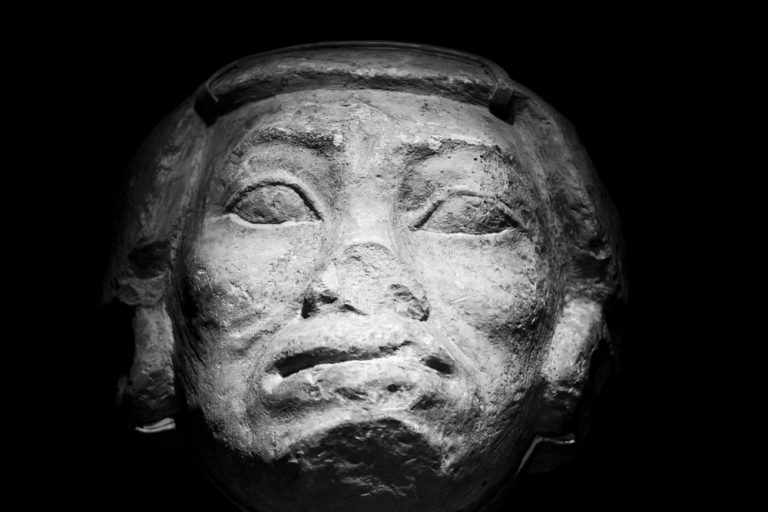 An ancient Egyptian carved limestone head