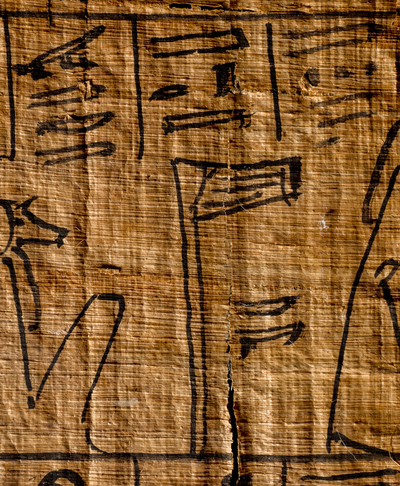 netjer hieroglyph on ancient Egyptian papyrus