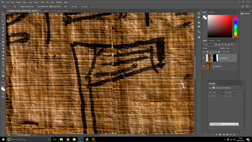 ancient Egyptian papyrus being 'repaired' in Photoshop