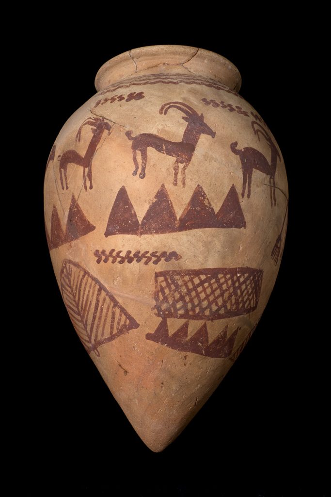 A large ancient Egyptian Predynastic pot with painted decoration of animals and nature