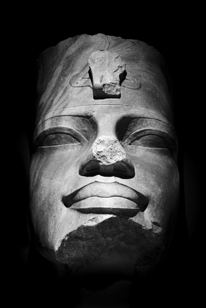 an ancient egyptian sculpture of a pharaoh's head