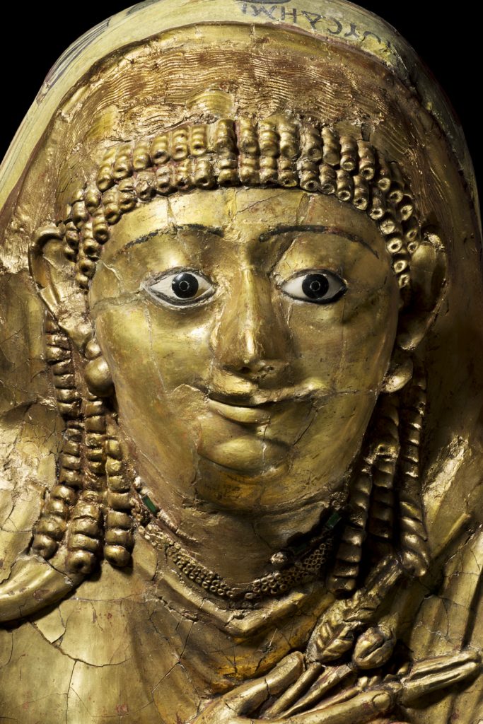 an ancient egyptian gilded mummy