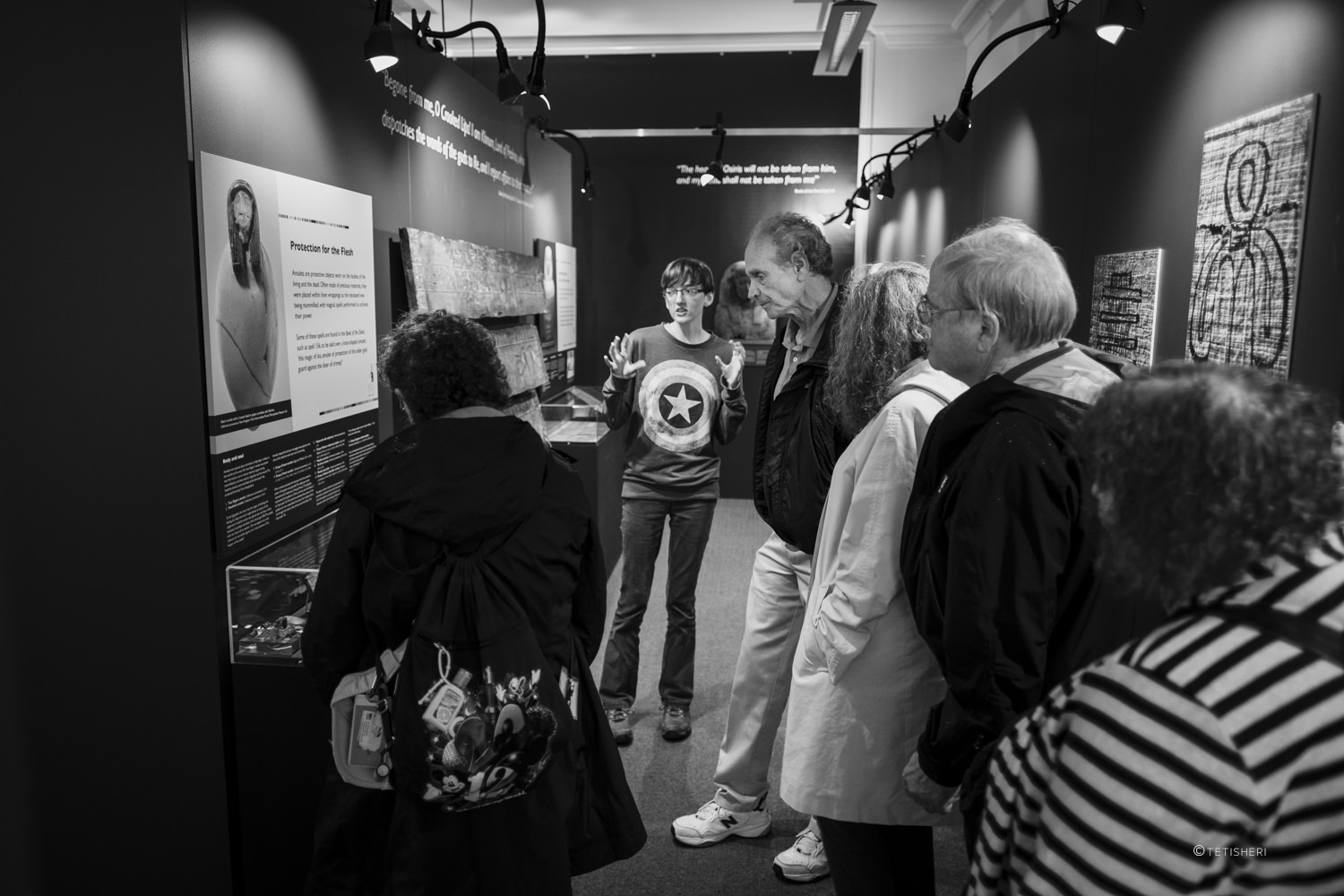 people visiting a museum exhibition about ancient egypt