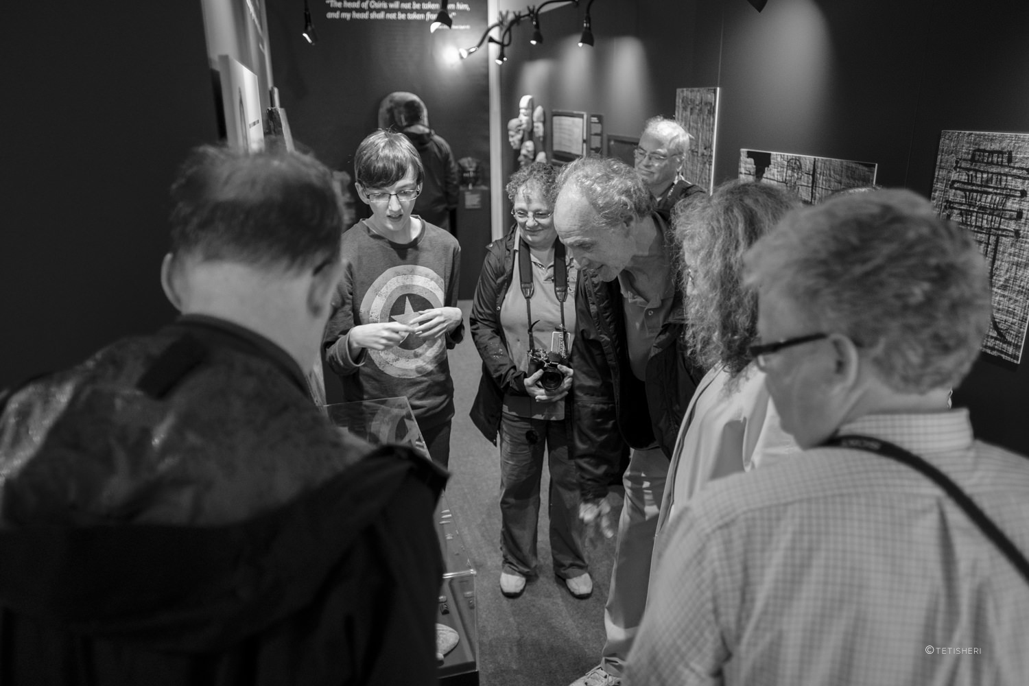 people visiting a museum exhibition about ancient egypt