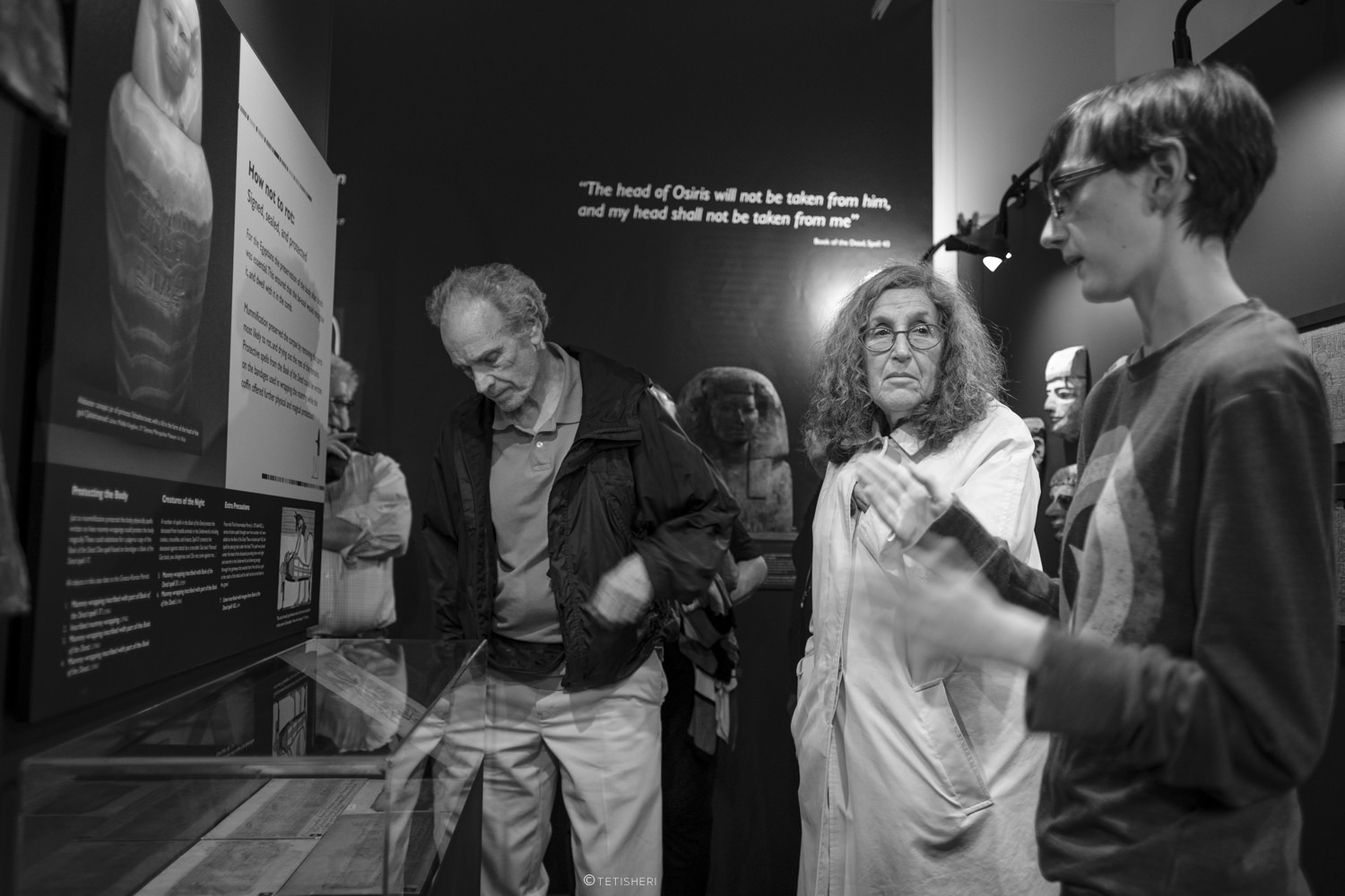 people visiting a museum exhibition about ancient egypt