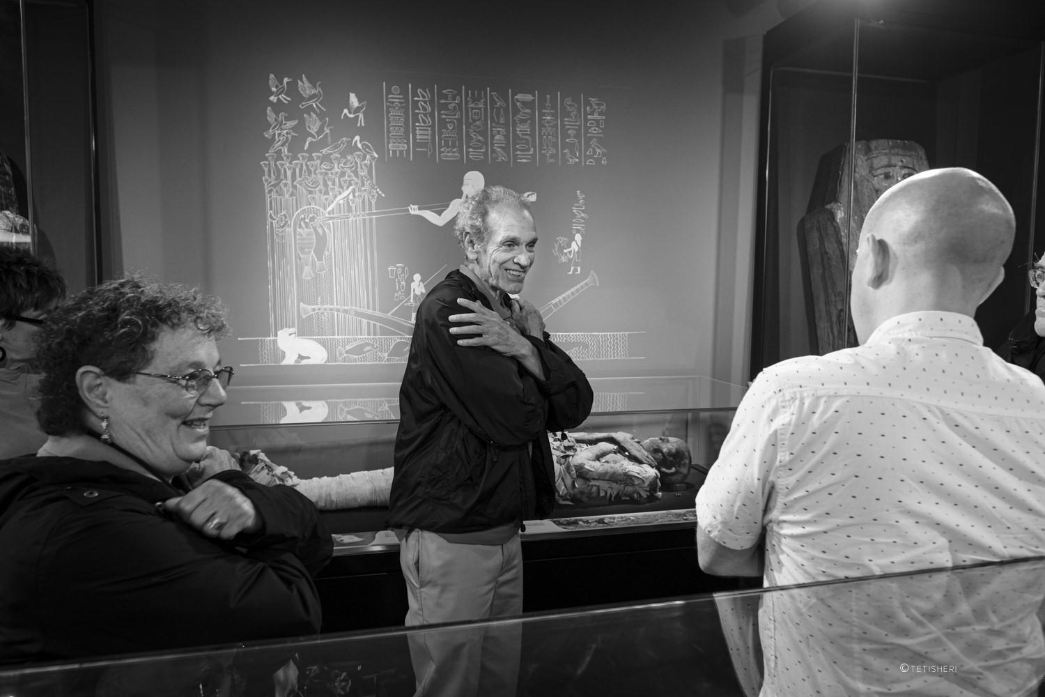 people visiting a museum exhibition about ancient egypt