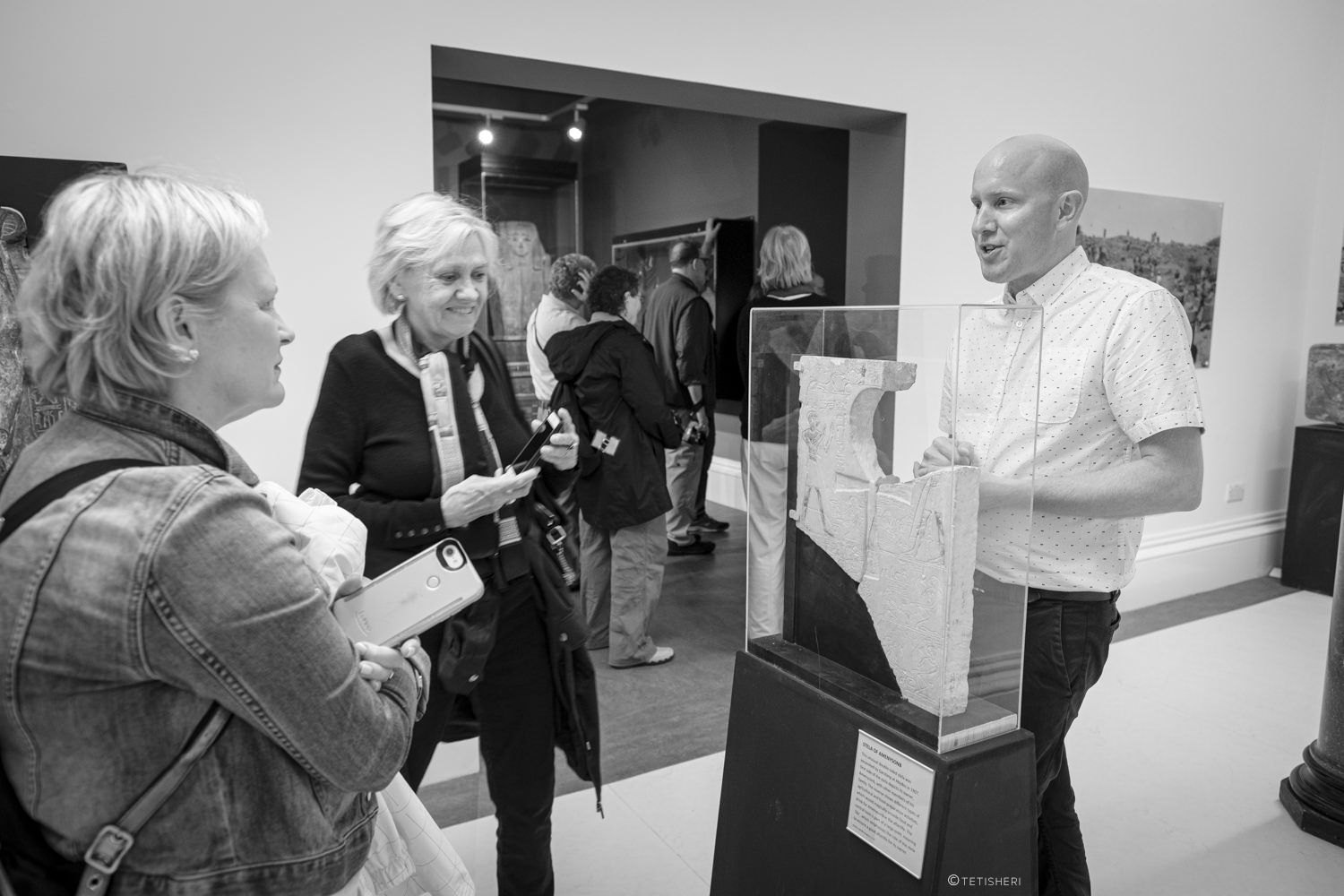 people visiting a museum exhibition about ancient egypt