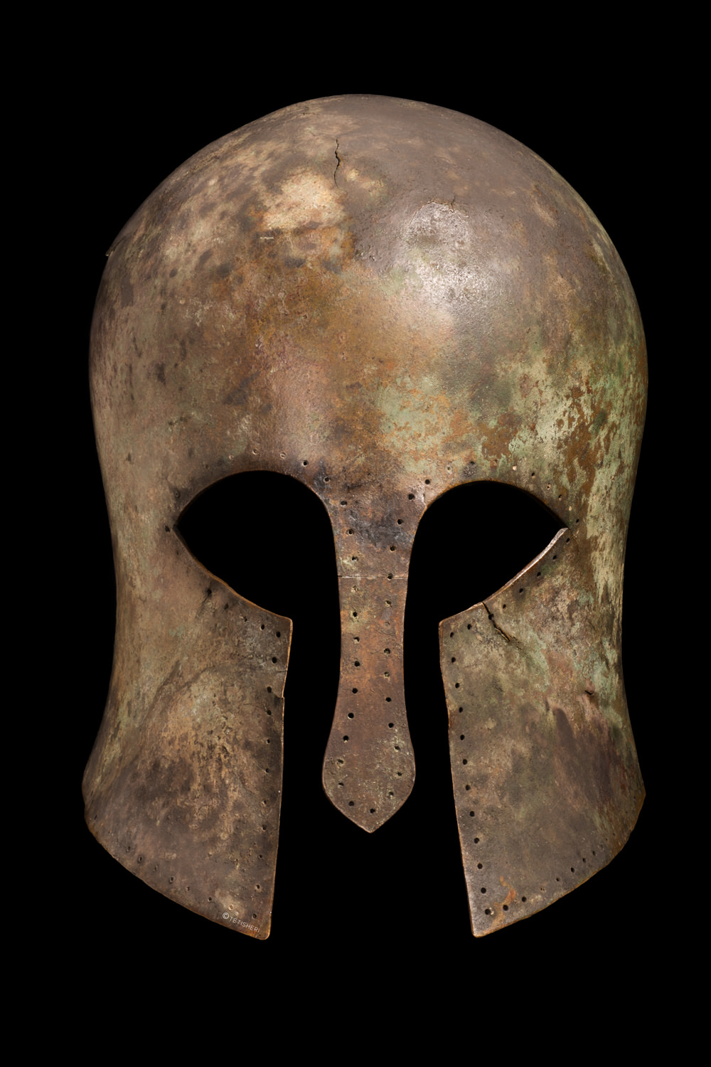 a bronze greek-style helmet