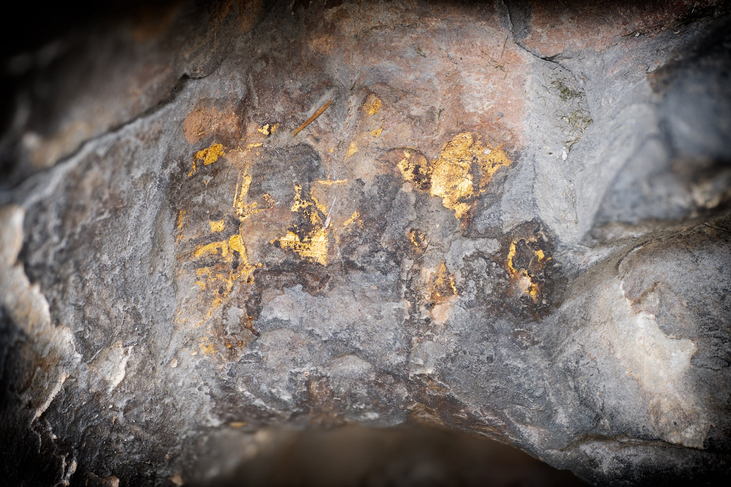 traces of gold leaf on a statue of the ancient egyptian goddess hathor