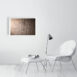 product image of the 41 by 61 cm re-horakhty and osiris photo print on a wall next to a chair and foot rest