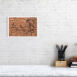 product image of the 41 by 61 cm woman offering incense photo print on a wall next to a chair and foot rest