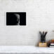 product image of the 20 by 30 cm re and mehen photo print on a wall next to a chair and foot rest