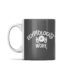 the left side of the grey egyptologist at work mug. it has the words 'egyptologist at work' with an egyptian sundisk in the centre flanked by two rearing cobras