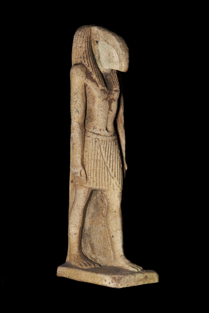 An ancient Egyptian amulet of Thoth as a standing man with an ibis head.